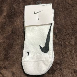 Nike crew socks. White and black. Men’s size 10-13. Women’s size 8-12